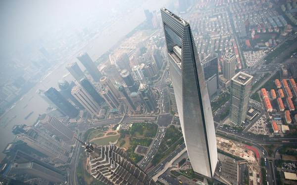 9. Trung tâm tài chính Shanghai World, Thượng Hải, Trung Quốc (492 m): Tòa tháp ấn tượng này được thiết kế theo biểu tượng trời và đất của Trung Quốc (đường lượn tròn và khoảng vuông ở giữa). Nơi đây cũng có khách sạn cao thứ 2 thế giới - Park Hyatt Shanghai. 