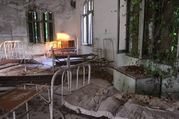 Một phòng bệnh bỏ hoang trên đảo Poveglia - Ảnh: wordpress